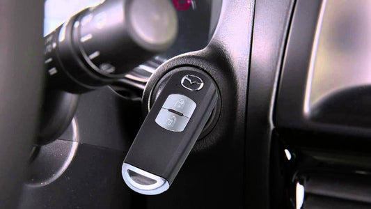 Comment changer la pile de clé pour MAZDA